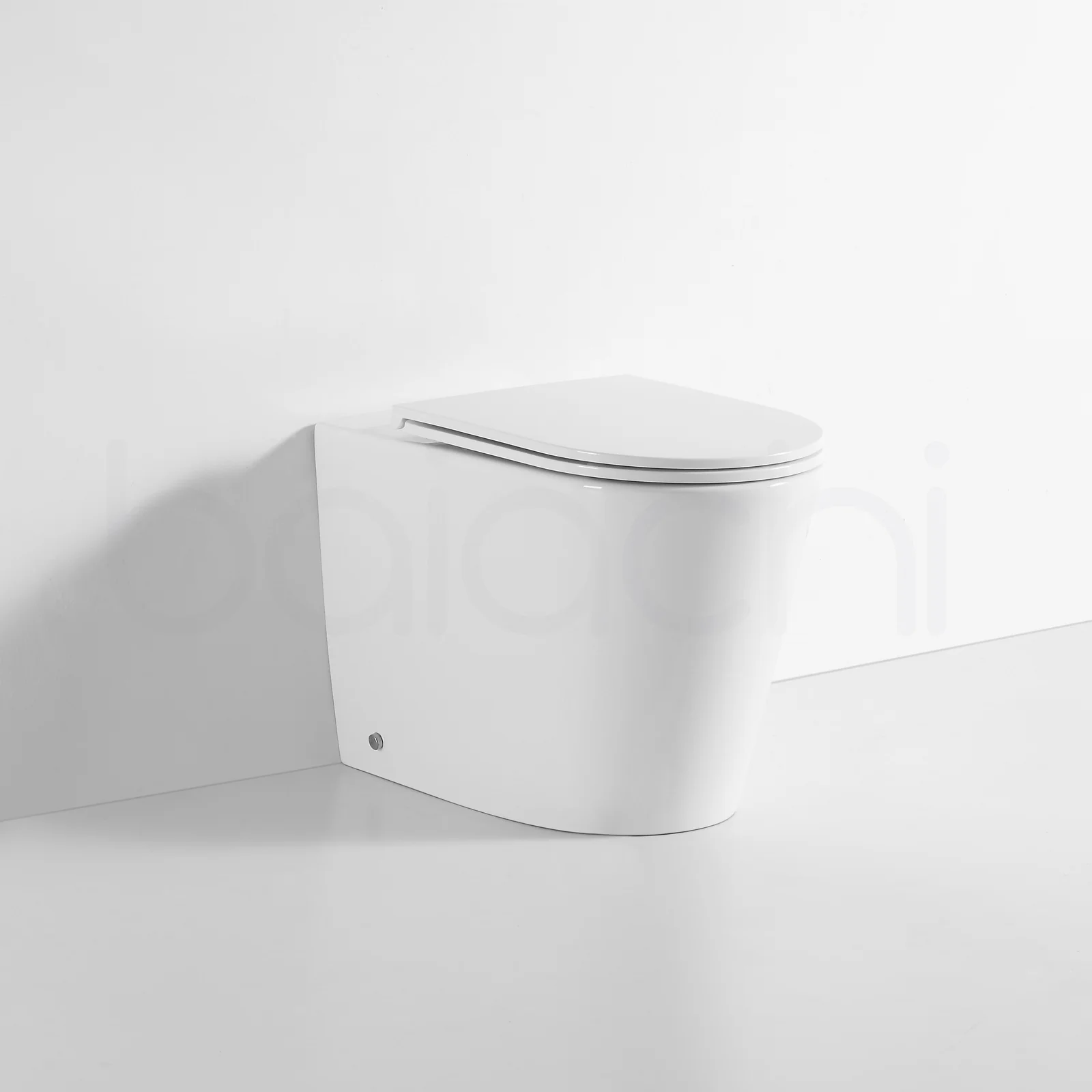 Ballina Rimless In Wall Toilet Suite with Round Brushed Nickel Flushing Buttons - Image 5